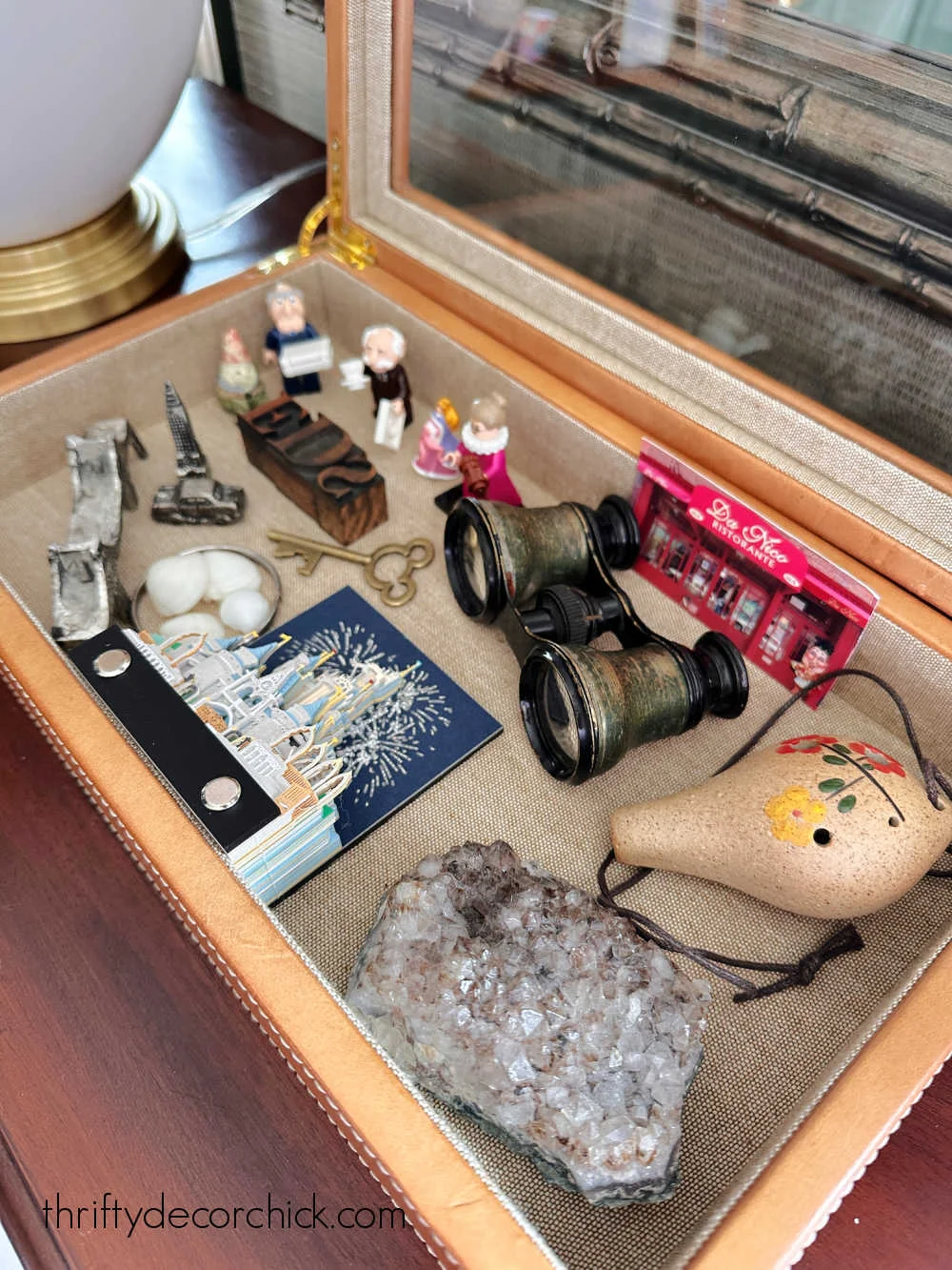 small keepsakes in glass display
